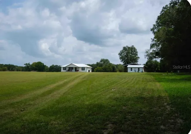 Photo 2 of Single family home for sale at 21411 Nw 209th Terrace, High Springs, FL 32643 | MLS# GC541747 | Listing updated on 2026-09-16