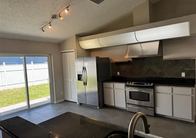 Photo 5 of Single family home for sale at 10104 Beefmaster Ct, New Port Richey, FL 34655 | MLS# TB8526484 | Listing updated on 2026-08-07