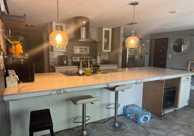 Photo 3 of Single family home for sale at 10424 Choice Dr, Port Richey, FL 34668 | MLS# TB8526495 | Listing updated on 2026-08-25