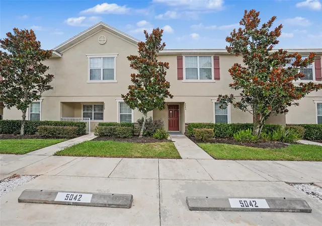 Photo 1 of Townhouse for sale at 5042 Chipotle Ln, Wesley Chapel, FL 33544 | MLS# O6422868 | Listing updated on 2026-10-01