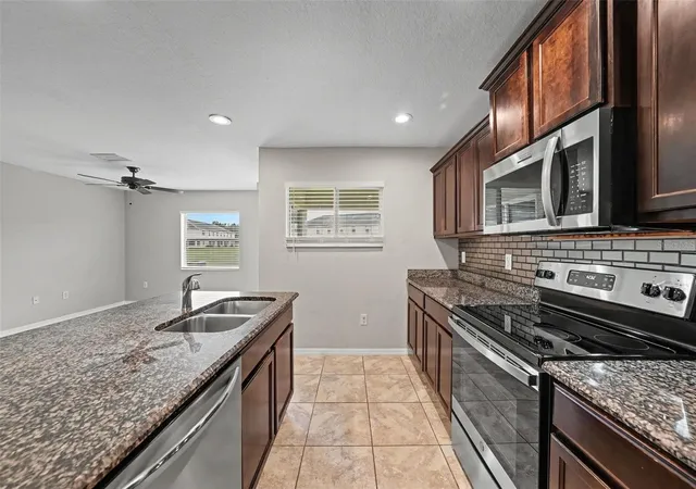 Photo 4 of Townhouse for sale at 5042 Chipotle Ln, Wesley Chapel, FL 33544 | MLS# O6422868 | Listing updated on 2026-10-01
