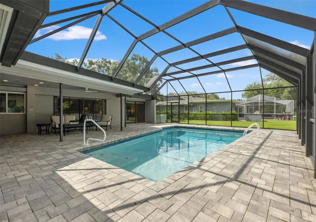 Photo 2 of Single family home for sale at 13916 Middle Park Dr, Tampa, FL 33624 | MLS# TB8526531 | Listing updated on 2026-10-05
