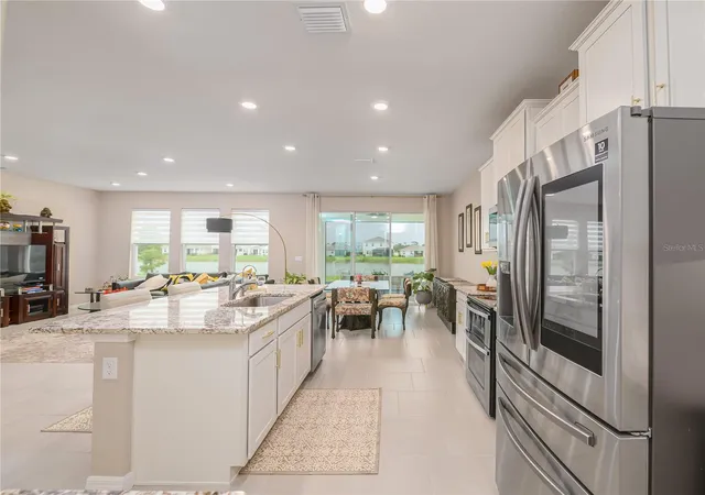 Photo 2 of Single family home for sale at 33634 Garden Sage Isle, Wesley Chapel, FL 33545 | MLS# TB8526625 | Listing updated on 2026-08-20