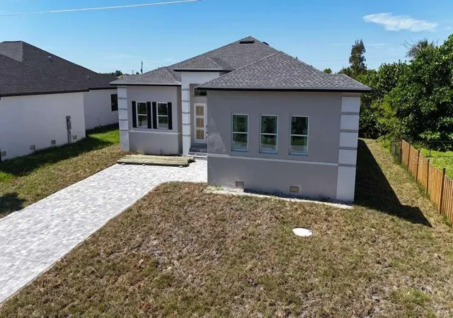 Photo 2 of Single family home for sale at 9351 Athel Dr, Port Charlotte, FL 33981 | MLS# O6422986 | Listing updated on 2026-09-29