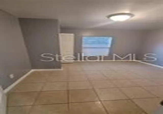 Listing Photo 2 - Condo for sale in building located at 3403 Temple St, TAMPA, FL 33619 - Unit #