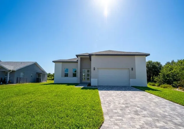 Photo 1 of Single family home for sale at 9390 Impala Cir, Port Charlotte, FL 33981 | MLS# O6423033 | Listing updated on 2026-09-02