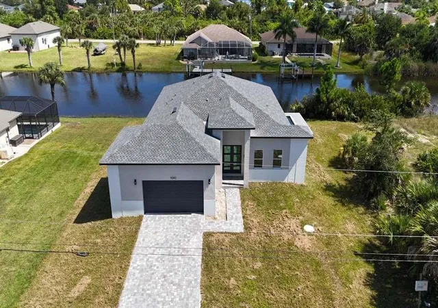 Photo 1 of Single family home for sale at 9390 Impala Cir, Port Charlotte, FL 33981 | MLS# O6423033 | Listing updated on 2026-10-13