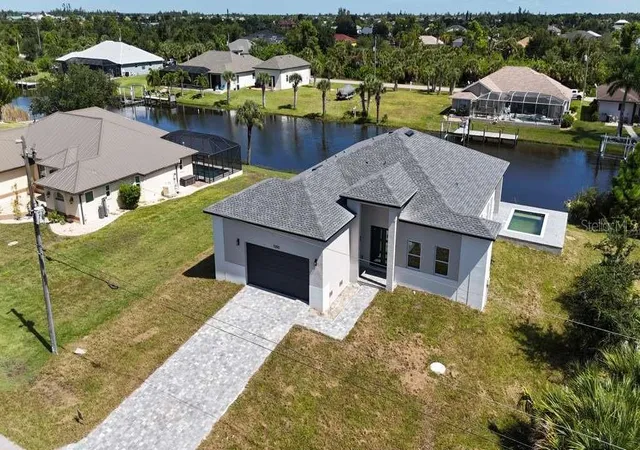 Photo 2 of Single family home for sale at 9390 Impala Cir, Port Charlotte, FL 33981 | MLS# O6423033 | Listing updated on 2026-10-13