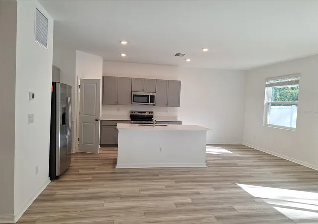 Photo 2 of Single family home for sale at 34916 Mulrion Dr, Zephyrhills, FL 33541 | MLS# TB8526689 | Listing updated on 2026-07-08