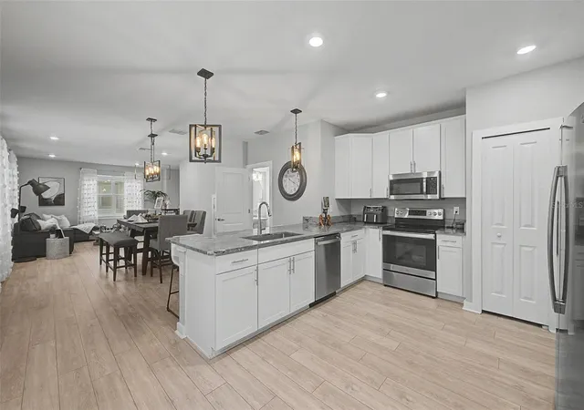 Photo 3 of Townhouse for sale at 6023 Interbay Blvd #1, Tampa, FL 33611 | MLS# TB8526701 | Listing updated on 2026-08-22