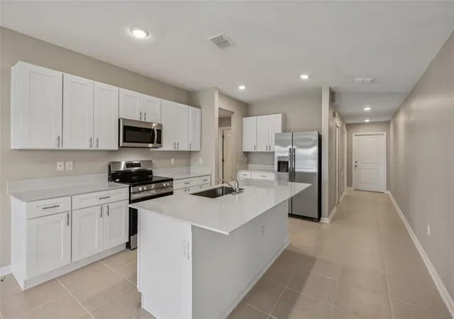 4th image of 1172 Belle Isle Ln, Daytona Beach, FL 32124 | MLS# O6423131