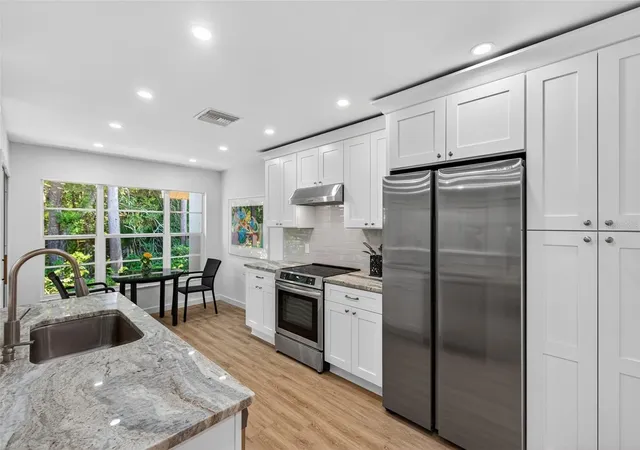Listing Photo 5 - Condo for sale in building located at 4916 Troon Ln, NEW PORT RICHEY, FL 34655