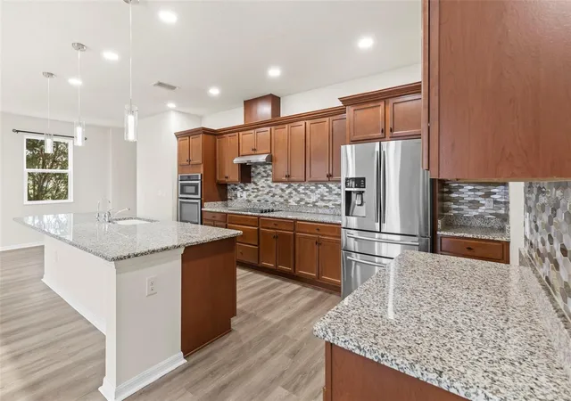 5th image of 12210 Moss Lake Loop, New Port Richey, FL 34655 | MLS# TB8526885