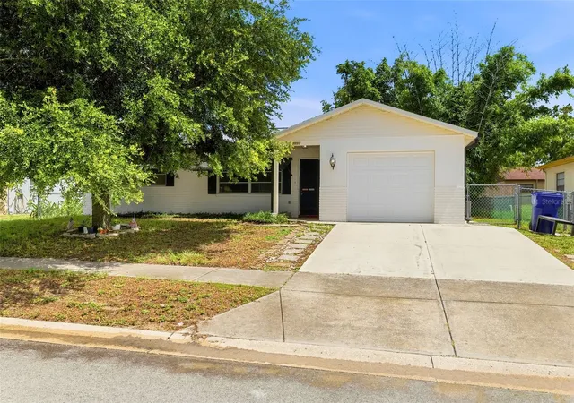 Photo 2 of Single family home for sale at 7819 Royal Stewart Dr, New Port Richey, FL 34653 | MLS# W7887441 | Listing updated on 2026-09-28