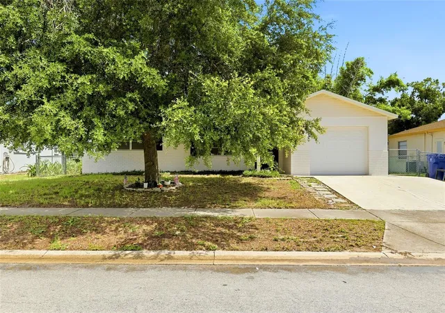 Photo 3 of Single family home for sale at 7819 Royal Stewart Dr, New Port Richey, FL 34653 | MLS# W7887441 | Listing updated on 2026-09-28