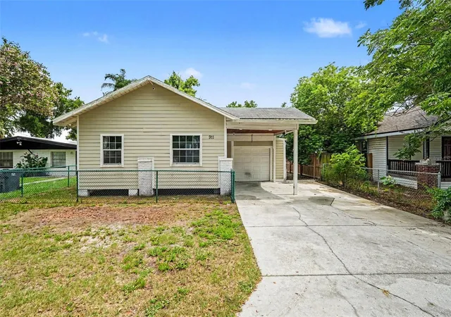 Photo 2 of Single family home for sale at 911 E 123rd Avenue, Tampa, FL 33612 | MLS# TB8526988 | Listing updated on 2026-08-28