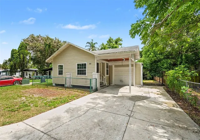 Photo 2 of Single family home for sale at 911 E 123rd Avenue, Tampa, FL 33612 | MLS# TB8526988 | Listing updated on 2026-08-28