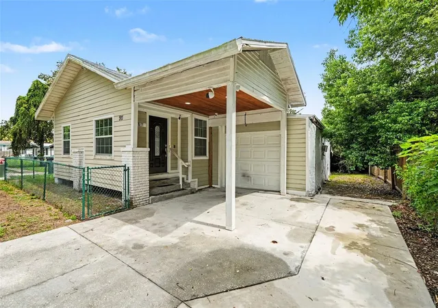 Photo 3 of Single family home for sale at 911 E 123rd Avenue, Tampa, FL 33612 | MLS# TB8526988 | Listing updated on 2026-08-28