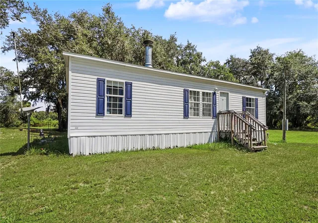 Photo 2 of Manufactured home for sale at 5435 NE 153rd Place Rd, Citra, FL 32113 | MLS# OM728077 | Listing updated on 2026-08-17
