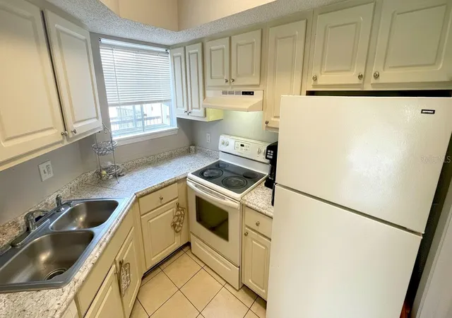 Photo 3 of Condo for sale at 1972 Lake Atriums Cir #200, Orlando, FL 32839 | MLS# O6423312 | Listing updated on 2026-07-09