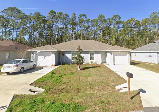 Photo 1 of Single family home for sale at 26 Riddle Dr, Palm Coast, FL 32164 | MLS# OM728086 | Listing updated on 2026-08-31