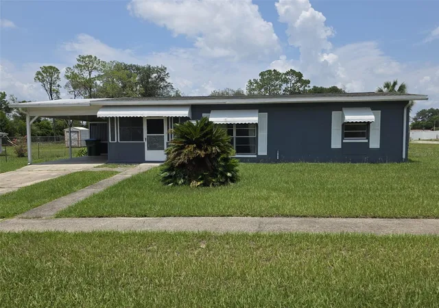 Photo 3 of Single family home for sale at 802 Crawford St, Deltona, FL 32725 | MLS# O6423330 | Listing updated on 2026-08-26