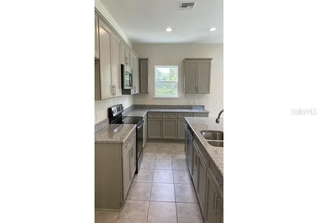 Photo 2 of Single family home for sale at 5961 Gottfried Ln, North Port, FL 34291 | MLS# OM728089 | Listing updated on 2026-07-11