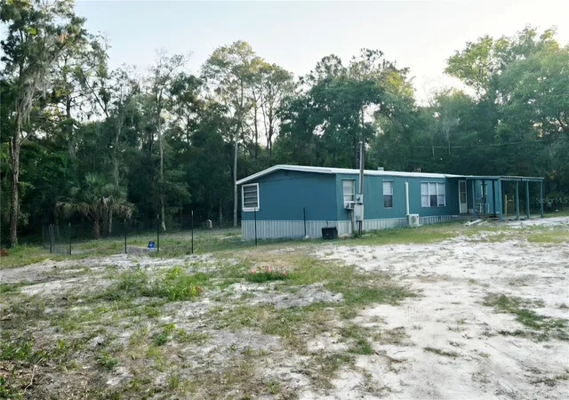 Photo 2 of Manufactured home for sale at 14207 Carolina Dove Rd, Weeki Wachee, FL 34614 | MLS# W7887465 | Listing updated on 2026-09-13
