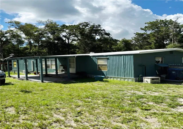 Photo 3 of Manufactured home for sale at 14207 Carolina Dove Rd, Weeki Wachee, FL 34614 | MLS# W7887465 | Listing updated on 2026-09-13