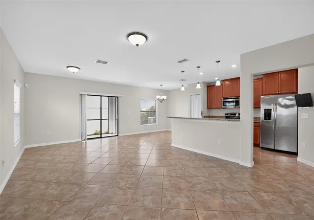 Photo 3 of Single family home for sale at 10105 Newminster Loop, Ruskin, FL 33573 | MLS# TB8527216 | Listing updated on 2026-10-08