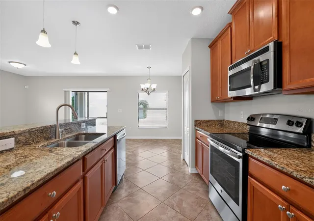 Photo 4 of Single family home for sale at 10105 Newminster Loop, Ruskin, FL 33573 | MLS# TB8527216 | Listing updated on 2026-10-08