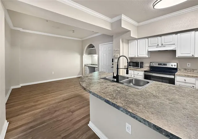 Photo 2 of Condo for sale at 911 N Orange Ave #232, Orlando, FL 32801 | MLS# O6423498 | Listing updated on 2026-09-25