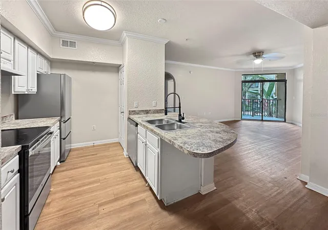 Photo 3 of Condo for sale at 911 N Orange Ave #232, Orlando, FL 32801 | MLS# O6423498 | Listing updated on 2026-09-25