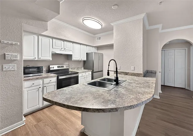 Photo 3 of Condo for sale at 911 N Orange Ave #232, Orlando, FL 32801 | MLS# O6423498 | Listing updated on 2026-09-25