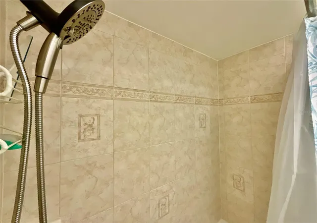 Listing Photo 2 - Condo for sale in building located at 10034 64Th Ave N, ST PETERSBURG, FL 33708 - Unit #11