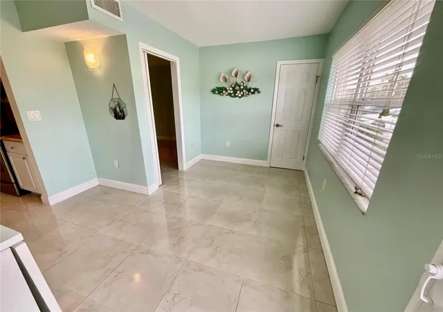 Listing Photo 4 - Condo for sale in building located at 10034 64Th Ave N, ST PETERSBURG, FL 33708 - Unit #11