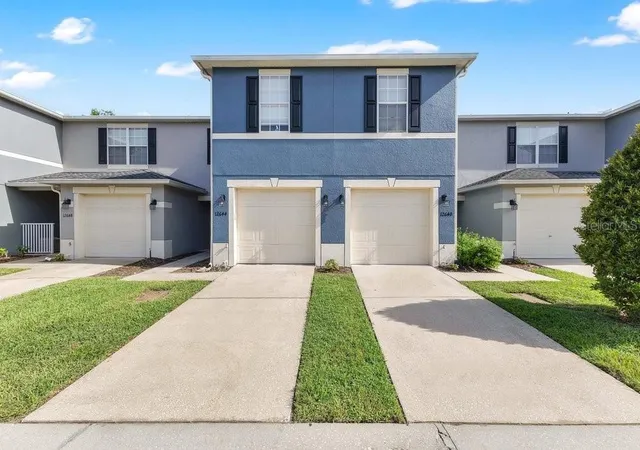 Photo 1 of Townhouse for sale at 12640 Somerset Oaks St, Orlando, FL 32828 | MLS# O6423528 | Listing updated on 2026-07-20