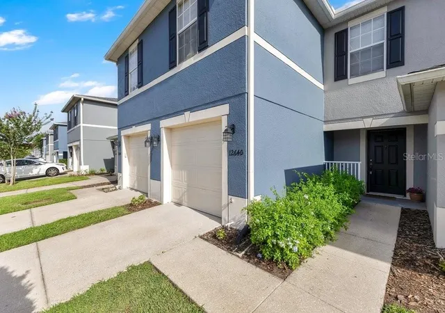 Photo 2 of Townhouse for sale at 12640 Somerset Oaks St, Orlando, FL 32828 | MLS# O6423528 | Listing updated on 2026-07-20