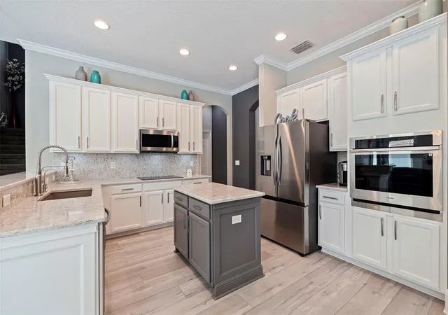 4th image of 11508 Oyster Bay Cir, New Port Richey, FL 34654 | MLS# TB8527308