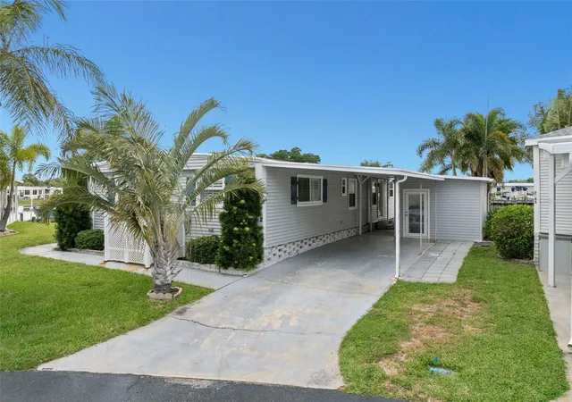 Photo 3 of Manufactured home for sale at 7162 Mount Arlington Dr NE #417, Saint Petersburg, FL 33702 | MLS# TB8527316 | Listing updated on 2026-09-27