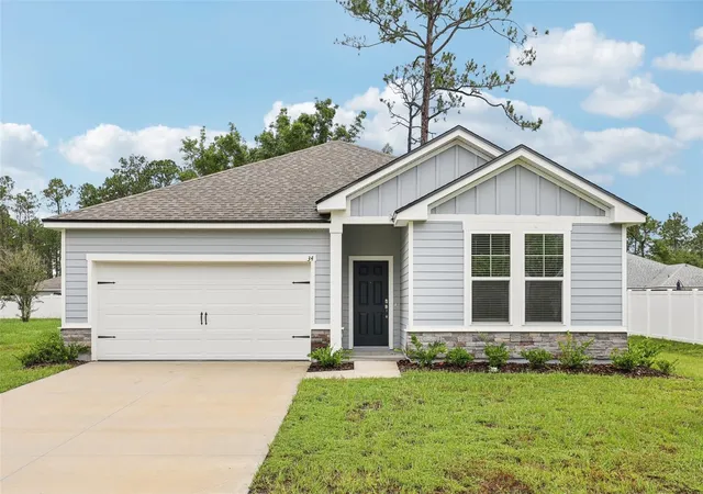 Photo 1 of Single family home for sale at 34 Reidsville Dr, Palm Coast, FL 32164 | MLS# FC319834 | Listing updated on 2026-10-02