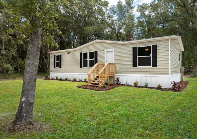 1st image of 104 Jackson Ave, Interlachen, FL 32148 | MLS# GC541815