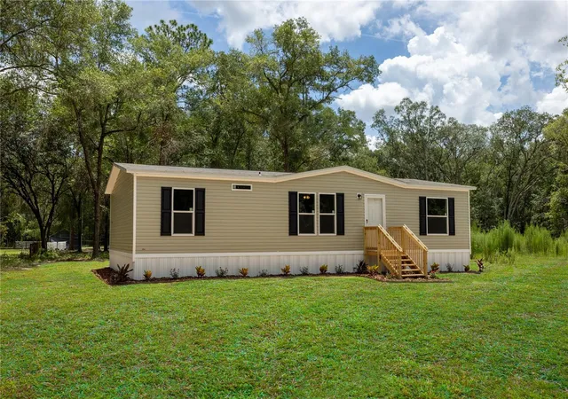 4th image of 104 Jackson Ave, Interlachen, FL 32148 | MLS# GC541815