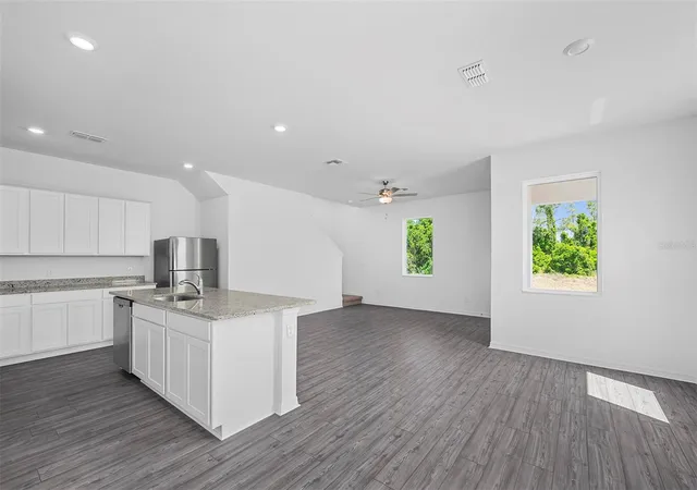 Photo 3 of Townhouse for sale at 568 Bay Leaf Dr, Kissimmee, FL 34759 | MLS# O6423754 | Listing updated on 2026-07-10