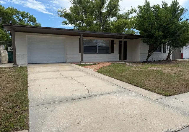 Homes for sale in Holiday, FL | 4606 Eastwood Ln, Holiday, FL 34690 | MLS# TB8527599