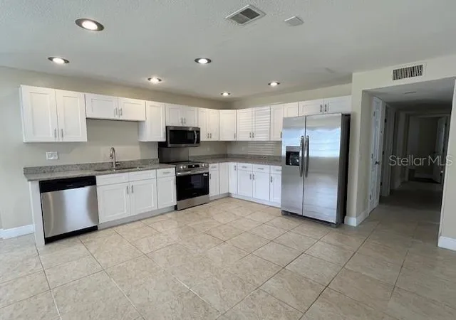 Photo 3 of Condo for sale at 9004 Tudor Dr #K104, Tampa, FL 33615 | MLS# TB8527611 | Listing updated on 2026-08-28