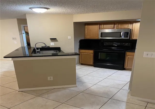 Listing Photo 4 - Condo for sale in building located at 4524 Commander Dr, Orlando, FL 32822 - Unit #1615