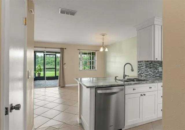 Photo 3 of Townhouse for sale at 11715 Windbourne Ct, Orlando, FL 32837 | MLS# O6423843 | Listing updated on 2026-08-31