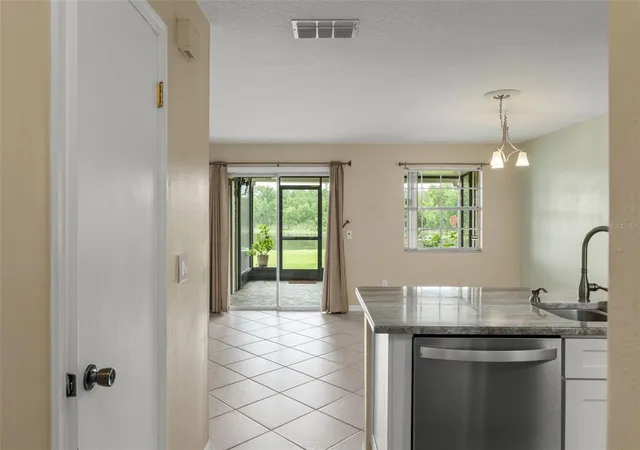 Photo 3 of Townhouse for sale at 11715 Windbourne Ct, Orlando, FL 32837 | MLS# O6423843 | Listing updated on 2026-08-31