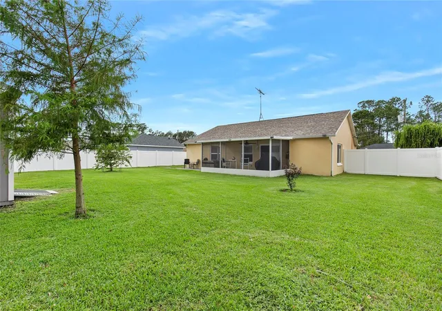 Photo 39 of Single family home for sale at 102 Eastwood Dr, Palm Coast, FL 32164 | MLS# FC319856 | Listing updated on 2026-07-10